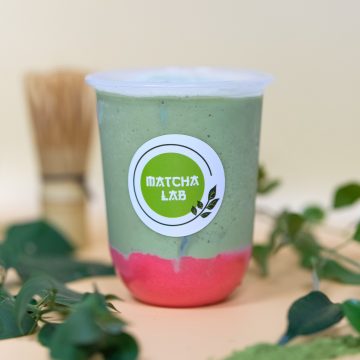 Strawberry foam matcha latte specialty drink at